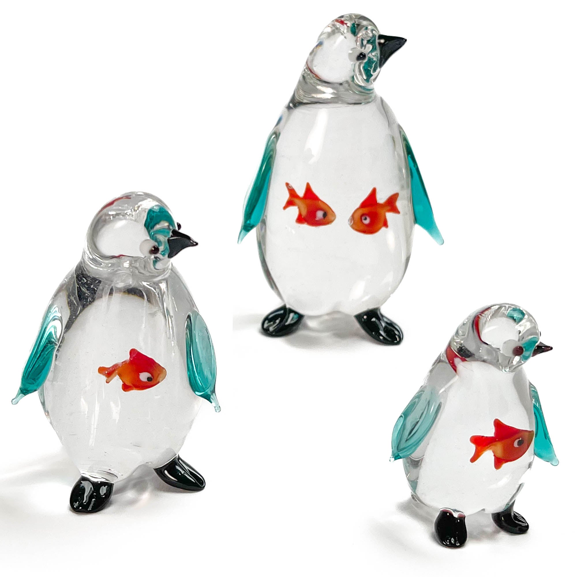 Penguin swallowing a fish - Murano Glass